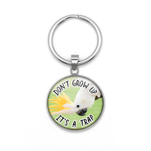 Load image into Gallery viewer, Don't Grow Up It's A Trap Keychain