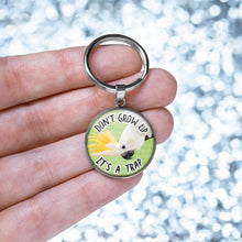 Load image into Gallery viewer, Don't Grow Up It's A Trap Keychain
