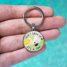 Load image into Gallery viewer, Don't Grow Up It's A Trap Keychain