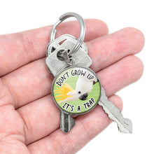 Load image into Gallery viewer, Don't Grow Up It's A Trap Keychain
