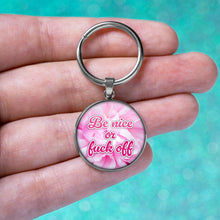 Load image into Gallery viewer, Be Nice or Fuck Off Keychain
